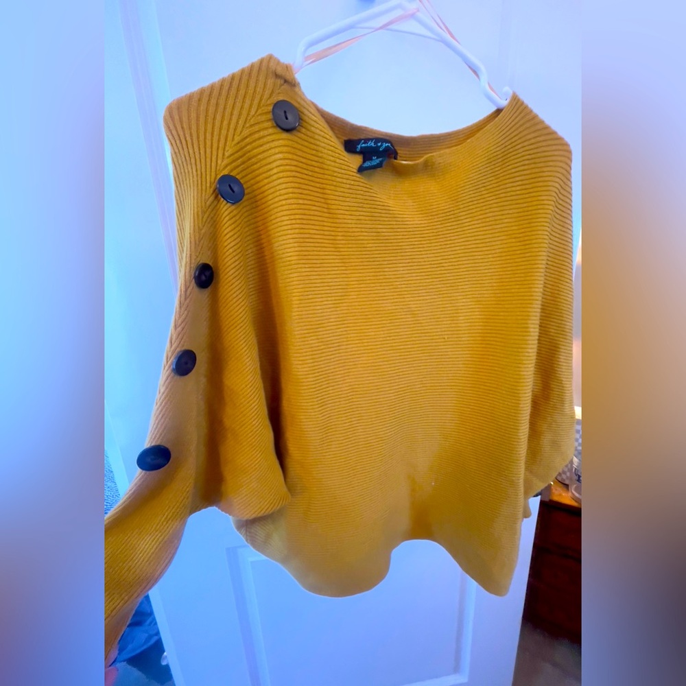 Faith and Zoe boat neck sweater with button details.